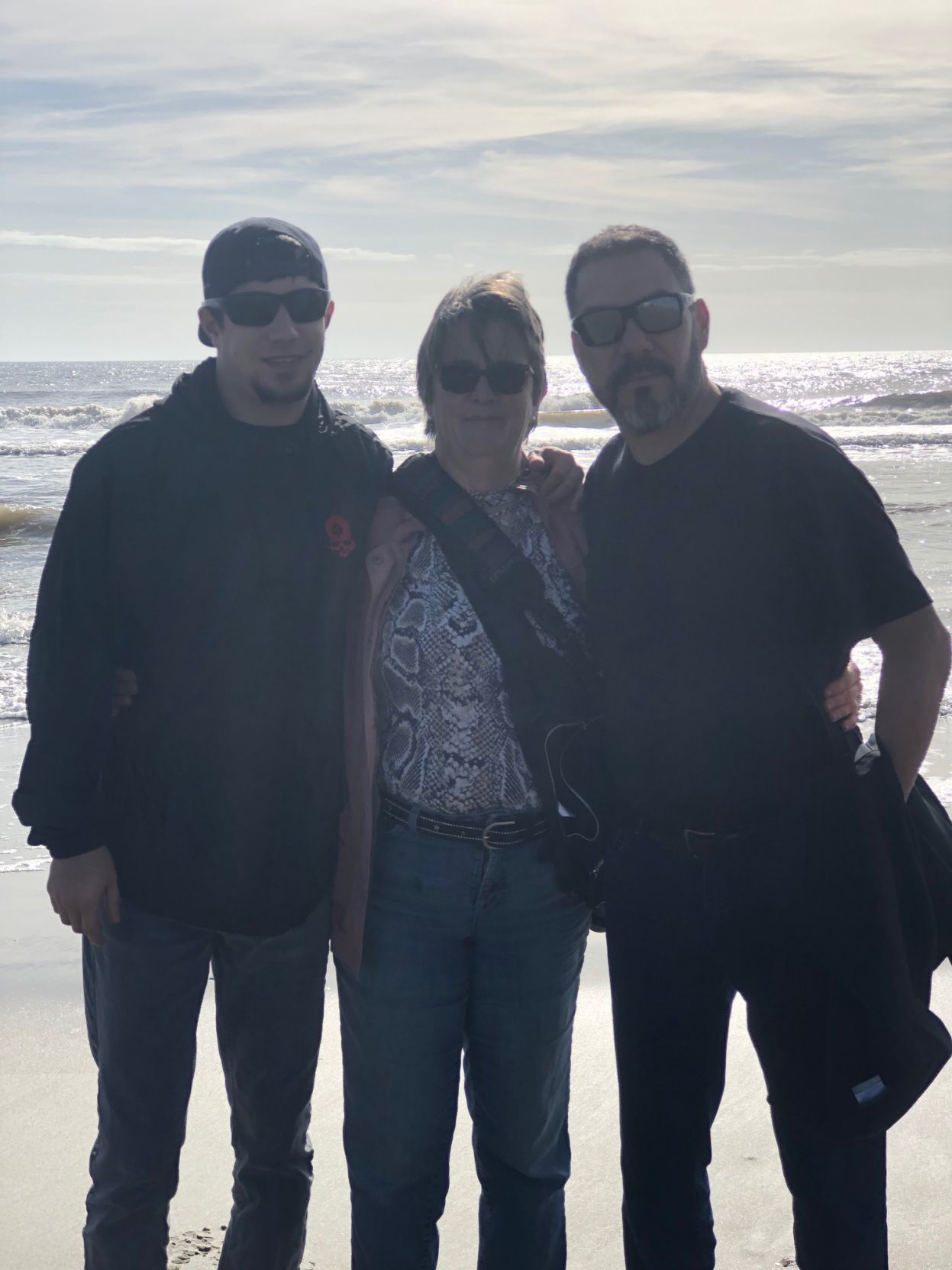 Adam and parents.jpg